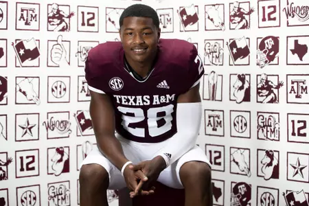 COLLEGE STATION, TX - July 29, 2021 - Running back Isaiah Spiller #28 of the Texas A&M Aggies during Texas A&M Aggies Football Photo Day in The Studio at Kyle Field in College Station, TX. Photo By Texas A&M Athletics/Texas A&M Athletics