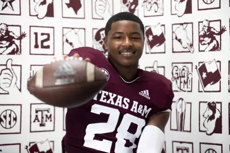 COLLEGE STATION, TX - July 29, 2021 - Running back Isaiah Spiller #28 of the Texas A&M Aggies during Texas A&M Aggies Football Photo Day in The Studio at Kyle Field in College Station, TX. Photo By Texas A&M Athletics/Texas A&M Athletics