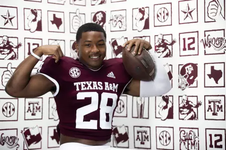 COLLEGE STATION, TX - July 29, 2021 - Running back Isaiah Spiller #28 of the Texas A&M Aggies during Texas A&M Aggies Football Photo Day in The Studio at Kyle Field in College Station, TX. Photo By Texas A&M Athletics/Texas A&M Athletics