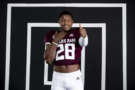 COLLEGE STATION, TX - July 29, 2021 - Running back Isaiah Spiller #28 of the Texas A&M Aggies during Texas A&M Aggies Football Photo Day in The Studio at Kyle Field in College Station, TX. Photo By Texas A&M Athletics/Texas A&M Athletics