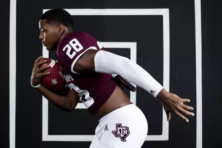 COLLEGE STATION, TX - July 29, 2021 - Running back Isaiah Spiller #28 of the Texas A&M Aggies during Texas A&M Aggies Football Photo Day in The Studio at Kyle Field in College Station, TX. Photo By Texas A&M Athletics/Texas A&M Athletics