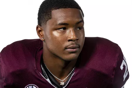COLLEGE STATION, TX - July 29, 2021 - Running back Isaiah Spiller #28 of the Texas A&M Aggies during Texas A&M Aggies Football Photo Day in The Studio at Kyle Field in College Station, TX. Photo By Texas A&M Athletics/Texas A&M Athletics