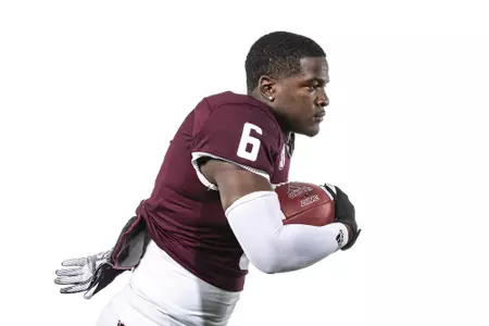 COLLEGE STATION, TX - July 29, 2021 - Running back Devon Achane #6 of the Texas A&M Aggies during Texas A&M Aggies Football Photo Day in The Studio at Kyle Field in College Station, TX. Photo By Texas A&M Athletics/Texas A&M Athletics