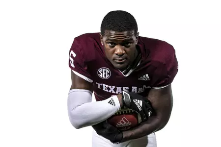 COLLEGE STATION, TX - July 29, 2021 - Running back Devon Achane #6 of the Texas A&M Aggies during Texas A&M Aggies Football Photo Day in The Studio at Kyle Field in College Station, TX. Photo By Texas A&M Athletics/Texas A&M Athletics