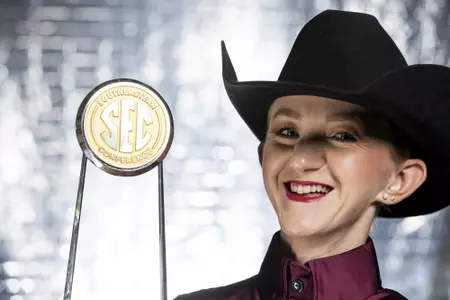 COLLEGE STATION, TX - August 25, 2021 - Hayley Riddle of the Texas A&M Aggies with SEC Conference Horsemanship Rider of the Year during Equestrian Photo Day in College Station, TX. Photo By Kate Luffman/Texas A&M Athletics