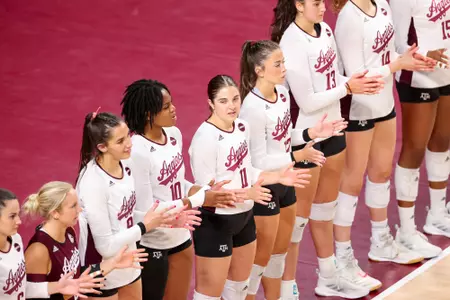 COLLEGE STATION, TX - October 23, 2022 - Opposite hitter Logan Lednicky #9 of the Texas A&M Aggies, Middle blocker Ifenna Cos-Okpalla #10 of the Texas A&M Aggies, Libero/Defensive specialist Allison Fields #11 of the Texas A&M Aggies, and Libero/Defensive specialist Ava Underwood #12 of the Texas A&M Aggies during the Volleyball game between the Kentucky Wildcats and the Texas A&M Aggies at Reed Arena in College Station, TX. Photo By Aiden Shertzer/Texas A&M Athletics