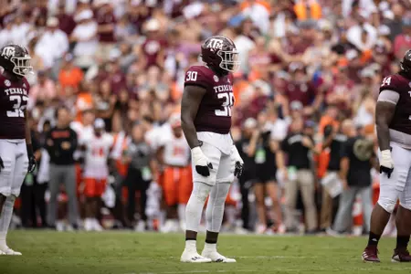 COLLEGE STATION, TX - September 03, 2022 - Defensive lineman Tunmise Adeleye #30 of the Texas A&M Aggies during the Football game between the Sam Houston St. Bearcats and the Texas A&M Aggies at Kyle Field in College Station, TX. Photo By Craig Bisacre/Texas A&M Athletics
