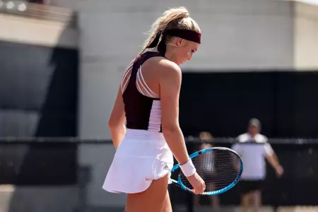 COLLEGE STATION, TX - May 14, 2022 - Jayci Goldsmith of the Texas A&M Aggies during the game between the Vanderbilt Commodores and the Texas A&M Aggies at Mitchell Tennis Center in College Station, TX. Photo By Sydney Morriss/Texas A&M Athletics