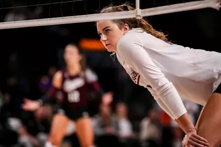 COLLEGE STATION, TX - November 16, 2022 - Middle blocker Molly Brown #14 of the Texas A&M Aggies during the game between the Tigers and the Texas A&M Aggies at Reed Arena in College Station, TX. Photo By Rachel Mahan/Texas A&M Athletics