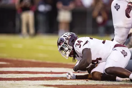 STARKVILLE, MS - October 01, 2022 - Running back LJ Johnson Jr. #34 of the Texas A&M Aggies during the Football game between the Mississippi St. Bulldogs and the Texas A&M Aggies at Davis Wade Stadium in Starkville, MS. Photo By Craig Bisacre