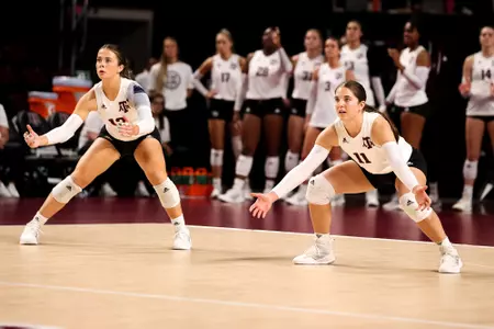 COLLEGE STATION, TX - November 02, 2022 - Libero/Defensive specialist Ava Underwood #12 of the Texas A&M Aggies and Libero/Defensive specialist Allison Fields #11 of the Texas A&M Aggies during the game between the Alabama Crimson Tide and the Texas A&M Aggies at Reed Arena in College Station, TX. Photo By Hayden Carroll/Texas A&M Athletics