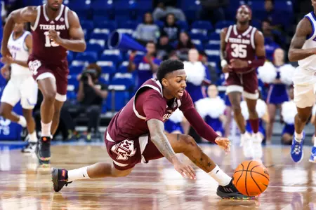 CHICAGO, IL - November 25, 2022 - Guard Wade Taylor IV #4 of the Texas A&M Aggies during the game between the DePaul Blue Demons and the Texas A&M Aggies at Wintrust Arena in Chicago, IL. Photo By Craig Bisacre