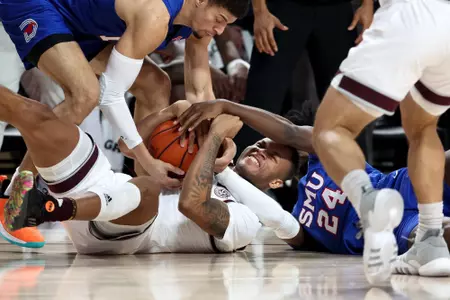 COLLEGE STATION, TX - November 30, 2022 - Guard Dexter Dennis #0 of the Texas A&M Aggies during the Men's Basketball game between the SMU Mustangs and the Texas A&M Aggies at Reed Arena in College Station, TX. Photo By Craig Bisacre/Texas A&M Athletics