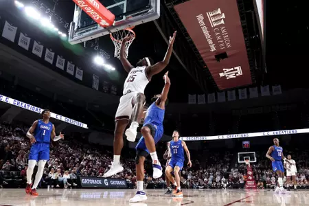 COLLEGE STATION, TX - November 30, 2022 - Forward Henry Coleman III #15 of the Texas A&M Aggies during the Men's Basketball game between the SMU Mustangs and the Texas A&M Aggies at Reed Arena in College Station, TX. Photo By Brendall O'Bannon/Texas A&M Athletics