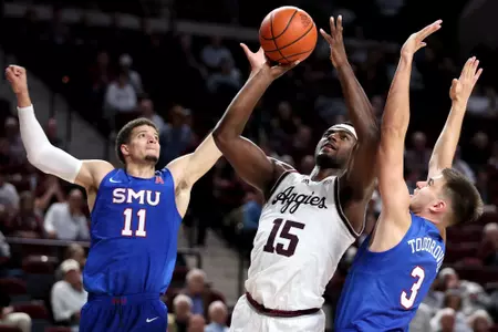 COLLEGE STATION, TX - November 30, 2022 - Forward Henry Coleman III #15 of the Texas A&M Aggies during the Men's Basketball game between the SMU Mustangs and the Texas A&M Aggies at Reed Arena in College Station, TX. Photo By Craig Bisacre/Texas A&M Athletics