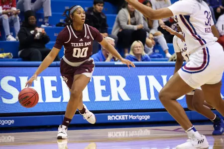 LAWRENCE, KS - November 30, 2022 - Guard Sydney Bowles #00 of the Texas A&M Aggies during the game between the Kansas Jayhawks and the Texas A&M Aggies at Allen Fieldhouse in Lawrence, KS. Photo By Ethan Mito/Texas A&M Athletics