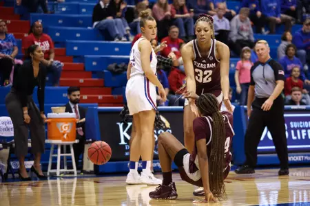 LAWRENCE, KS - November 30, 2022 - Forward Aaliyah Patty #32 of the Texas A&M Aggies and Guard Sahara Jones #24 of the Texas A&M Aggies during the game between the Kansas Jayhawks and the Texas A&M Aggies at Allen Fieldhouse in Lawrence, KS. Photo By Ethan Mito/Texas A&M Athletics