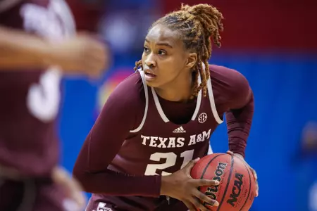 LAWRENCE, KS - November 30, 2022 - Guard Eriny Kindred #21 of the Texas A&M Aggies during the game between the Kansas Jayhawks and the Texas A&M Aggies at Allen Fieldhouse in Lawrence, KS. Photo By Ethan Mito/Texas A&M Athletics