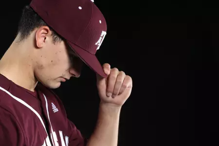 COLLEGE STATION, TX - January 12, 2022 - Pitcher Khristian Curtis #30 of the Texas A&M Aggies during the Texas A&M Aggies 2022 Baseball Photo Day in The Studio in Kyle Field College Station, TX. Photo By Craig Bisacre/Texas A&M Athletics