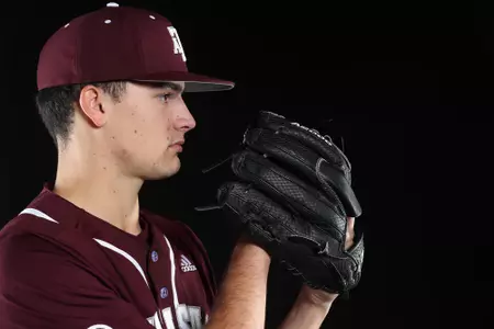 COLLEGE STATION, TX - January 12, 2022 - Pitcher Khristian Curtis #30 of the Texas A&M Aggies during the Texas A&M Aggies 2022 Baseball Photo Day in The Studio in Kyle Field College Station, TX. Photo By Craig Bisacre/Texas A&M Athletics