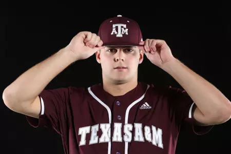 COLLEGE STATION, TX - January 12, 2022 - Pitcher Rawley Hector #5 of the Texas A&M Aggies during Texas A&M Aggies Baseball photo day in College Station, TX. Photo By Craig Bisacre/Texas A&M Athletics