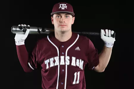 COLLEGE STATION, TX - January 12, 2022 - Outfielder Austin Bost #11 of the Texas A&M Aggies during Texas A&M Aggies Baseball photo day in College Station, TX. Photo By Craig Bisacre/Texas A&M Athletics