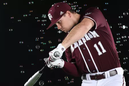COLLEGE STATION, TX - January 12, 2022 - Outfielder Austin Bost #11 of the Texas A&M Aggies during Texas A&M Aggies Baseball photo day in College Station, TX. Photo By Craig Bisacre/Texas A&M Athletics