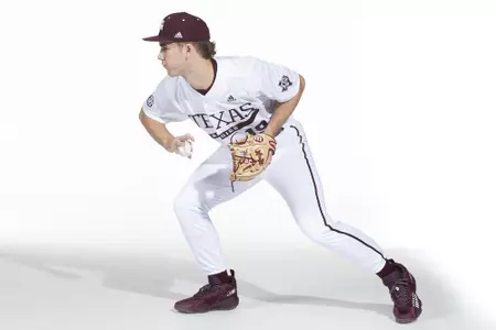 COLLEGE STATION, TX - January 12, 2022 - infielder Ty Hodge #19 of the Texas A&M Aggies during the Texas A&M Aggies 2022 Baseball Photo Day in The Studio in Kyle Field College Station, TX. Photo By Craig Bisacre/Texas A&M Athletics