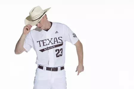 COLLEGE STATION, TX - January 12, 2022 - outfielder Brett Minnich #23 of the Texas A&M Aggies during the Texas A&M Aggies 2022 Baseball Photo Day in The Studio in Kyle Field College Station, TX. Photo By Craig Bisacre/Texas A&M Athletics