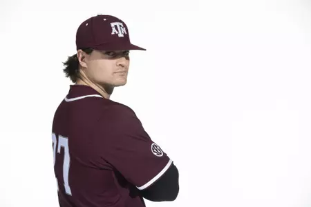 COLLEGE STATION, TX - January 12, 2022 - outfielder Dylan Rock #27 of the Texas A&M Aggies during the Texas A&M Aggies 2022 Baseball Photo Day in The Studio in Kyle Field College Station, TX. Photo By Craig Bisacre/Texas A&M Athletics