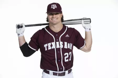 COLLEGE STATION, TX - January 12, 2022 - outfielder Dylan Rock #27 of the Texas A&M Aggies during the Texas A&M Aggies 2022 Baseball Photo Day in The Studio in Kyle Field College Station, TX. Photo By Craig Bisacre/Texas A&M Athletics