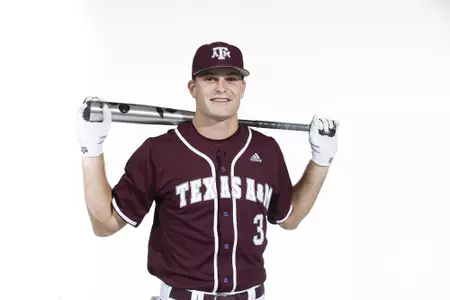COLLEGE STATION, TX - January 12, 2022 - outfielder Logan Britt #3 of the Texas A&M Aggies during the Texas A&M Aggies 2022 Baseball Photo Day in The Studio in Kyle Field College Station, TX. Photo By Craig Bisacre/Texas A&M Athletics