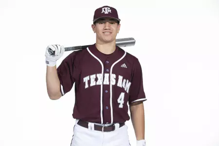 COLLEGE STATION, TX - January 12, 2022 - infielder Kalae Harrison #4 of the Texas A&M Aggies during the Texas A&M Aggies 2022 Baseball Photo Day in The Studio in Kyle Field College Station, TX. Photo By Craig Bisacre/Texas A&M Athletics