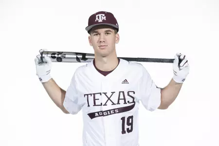 COLLEGE STATION, TX - January 12, 2022 - infielder Ty Hodge #19 of the Texas A&M Aggies during the Texas A&M Aggies 2022 Baseball Photo Day in The Studio in Kyle Field College Station, TX. Photo By Craig Bisacre/Texas A&M Athletics