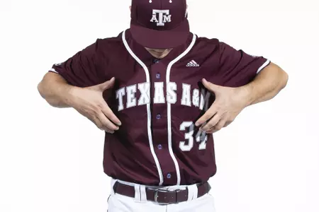 COLLEGE STATION, TX - January 12, 2022 - right hand pitcher Micah Dallas #34 of the Texas A&M Aggies during the Texas A&M Aggies 2022 Baseball Photo Day in The Studio in Kyle Field College Station, TX. Photo By Craig Bisacre/Texas A&M Athletics