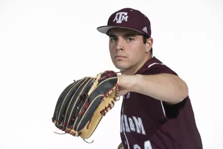 COLLEGE STATION, TX - January 12, 2022 - right hand pitcher Micah Dallas #34 of the Texas A&M Aggies during the Texas A&M Aggies 2022 Baseball Photo Day in The Studio in Kyle Field College Station, TX. Photo By Craig Bisacre/Texas A&M Athletics