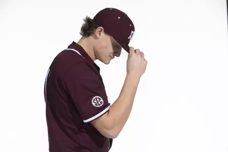 COLLEGE STATION, TX - January 12, 2022 - left hand pitcher Will Johnston #15 of the Texas A&M Aggies during the Texas A&M Aggies 2022 Baseball Photo Day in The Studio in Kyle Field College Station, TX. Photo By Craig Bisacre/Texas A&M Athletics