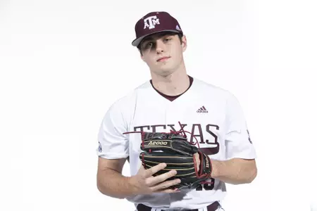 COLLEGE STATION, TX - January 12, 2022 - right hand pitcher/outfielder Robert Hogan #13 of the Texas A&M Aggies during the Texas A&M Aggies 2022 Baseball Photo Day in The Studio in Kyle Field College Station, TX. Photo By Craig Bisacre/Texas A&M Athletics