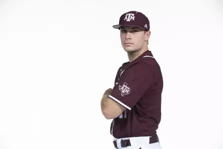 COLLEGE STATION, TX - January 12, 2022 - infielder Austin Bost #11 of the Texas A&M Aggies during the Texas A&M Aggies 2022 Baseball Photo Day in The Studio in Kyle Field College Station, TX. Photo By Craig Bisacre/Texas A&M Athletics
