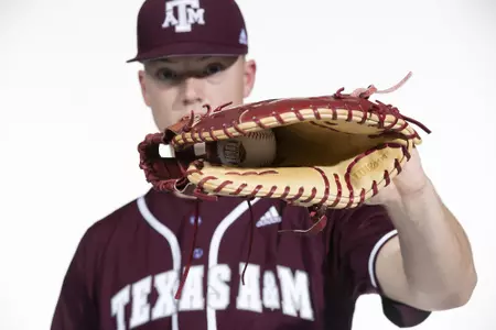 COLLEGE STATION, TX - January 12, 2022 - infielder/outfielder Jack Moss #9 of the Texas A&M Aggies during the Texas A&M Aggies 2022 Baseball Photo Day in The Studio in Kyle Field College Station, TX. Photo By Craig Bisacre/Texas A&M Athletics