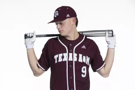 COLLEGE STATION, TX - January 12, 2022 - infielder/outfielder Jack Moss #9 of the Texas A&M Aggies during the Texas A&M Aggies 2022 Baseball Photo Day in The Studio in Kyle Field College Station, TX. Photo By Craig Bisacre/Texas A&M Athletics