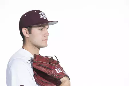 COLLEGE STATION, TX - January 12, 2022 - left hand pitcher Jacob Palisch #33 of the Texas A&M Aggies during the Texas A&M Aggies 2022 Baseball Photo Day in The Studio in Kyle Field College Station, TX. Photo By Craig Bisacre/Texas A&M Athletics