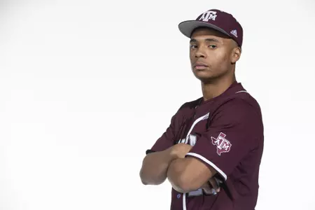 COLLEGE STATION, TX - January 12, 2022 - right hand pitcher Xavier Lovett #20 of the Texas A&M Aggies during the Texas A&M Aggies 2022 Baseball Photo Day in The Studio in Kyle Field College Station, TX. Photo By Craig Bisacre/Texas A&M Athletics