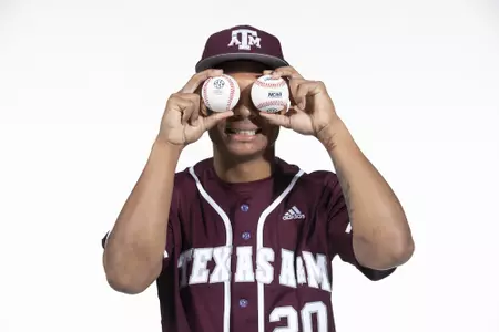 COLLEGE STATION, TX - January 12, 2022 - right hand pitcher Xavier Lovett #20 of the Texas A&M Aggies during the Texas A&M Aggies 2022 Baseball Photo Day in The Studio in Kyle Field College Station, TX. Photo By Craig Bisacre/Texas A&M Athletics