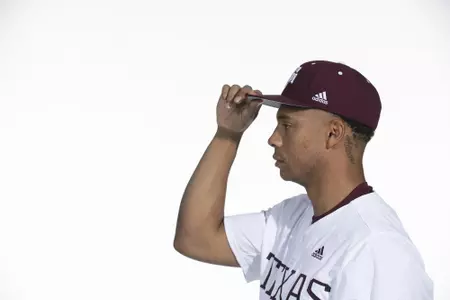 COLLEGE STATION, TX - January 12, 2022 - right hand pitcher Xavier Lovett #20 of the Texas A&M Aggies during the Texas A&M Aggies 2022 Baseball Photo Day in The Studio in Kyle Field College Station, TX. Photo By Craig Bisacre/Texas A&M Athletics