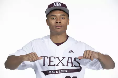 COLLEGE STATION, TX - January 12, 2022 - right hand pitcher Xavier Lovett #20 of the Texas A&M Aggies during the Texas A&M Aggies 2022 Baseball Photo Day in The Studio in Kyle Field College Station, TX. Photo By Craig Bisacre/Texas A&M Athletics