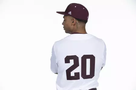 COLLEGE STATION, TX - January 12, 2022 - right hand pitcher Xavier Lovett #20 of the Texas A&M Aggies during the Texas A&M Aggies 2022 Baseball Photo Day in The Studio in Kyle Field College Station, TX. Photo By Craig Bisacre/Texas A&M Athletics