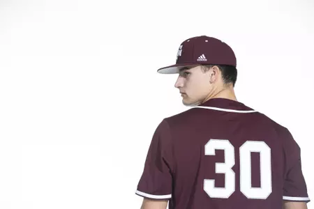 COLLEGE STATION, TX - January 12, 2022 - infielder/right hand pitcher Khristian Curtis #30 of the Texas A&M Aggies during the Texas A&M Aggies 2022 Baseball Photo Day in The Studio in Kyle Field College Station, TX. Photo By Craig Bisacre/Texas A&M Athletics