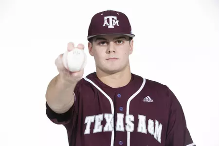 COLLEGE STATION, TX - January 12, 2022 - right hand pitcher Rawley Hector #5 of the Texas A&M Aggies during the Texas A&M Aggies 2022 Baseball Photo Day in The Studio in Kyle Field College Station, TX. Photo By Craig Bisacre/Texas A&M Athletics