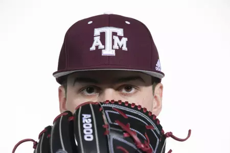 COLLEGE STATION, TX - January 12, 2022 - right hand pitcher Rawley Hector #5 of the Texas A&M Aggies during the Texas A&M Aggies 2022 Baseball Photo Day in The Studio in Kyle Field College Station, TX. Photo By Craig Bisacre/Texas A&M Athletics